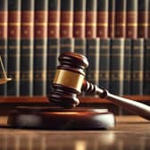 The court heard the metal barrier on the back of a track was a danger to people and property