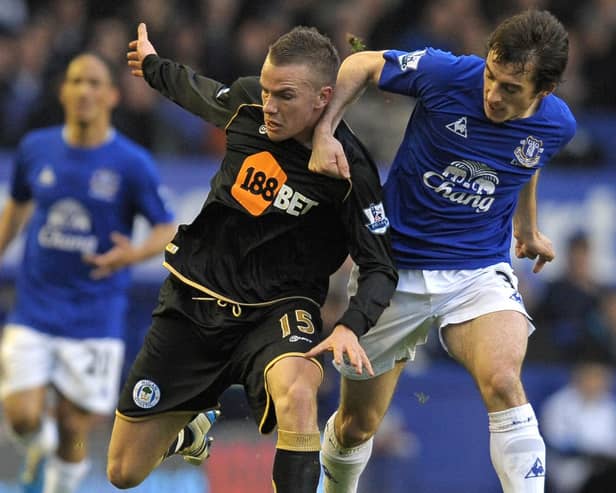 Tom Cleverley during his Latics days, doing battle with Leighton Baines at Everton