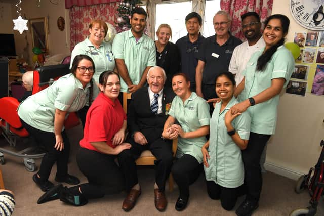 Jack Fletcher celebrates his 100th birthday with staff at Shawcross care home