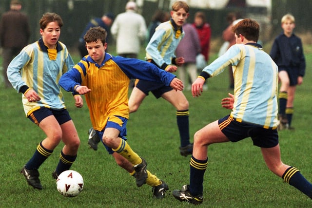 Action from the Under-15s clash between Hawkley and Falcons in a Wigan Youth League match at Little Lane on Sunday 21st of December 1997.