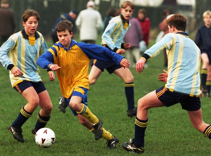 Action from the Under-15s clash between Hawkley and Falcons in a Wigan Youth League match at Little Lane on Sunday 21st of December 1997.