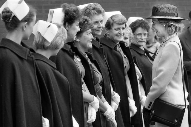 The Duchess of Gloucester talks to nurses before officially opening the Elderly Care Unit at Whelley Hospital on Wednesday 12th of September 1990. 