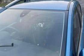 The rocks smashed the windscreen of another car