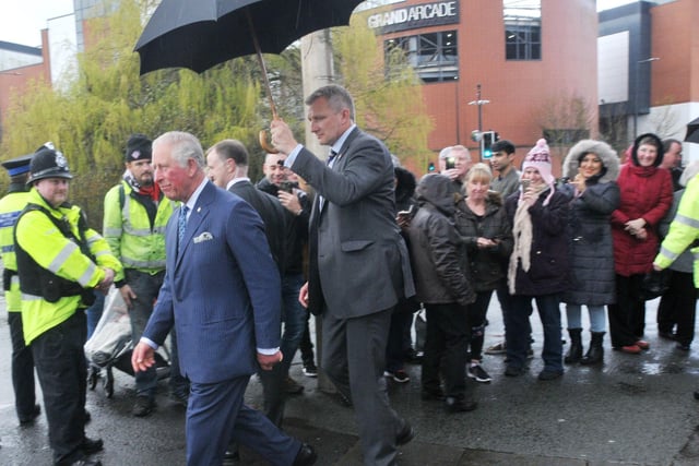 Prince Charles meets the crowd waiting outside Wigan Little Theatre, Wigan.