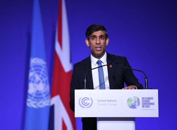<p>Rishi Sunak pictured delivering a speech at the COP26 UN Climate Summit in Glasgow last year. PIC: DANIEL LEAL/AFP via Getty Images</p>