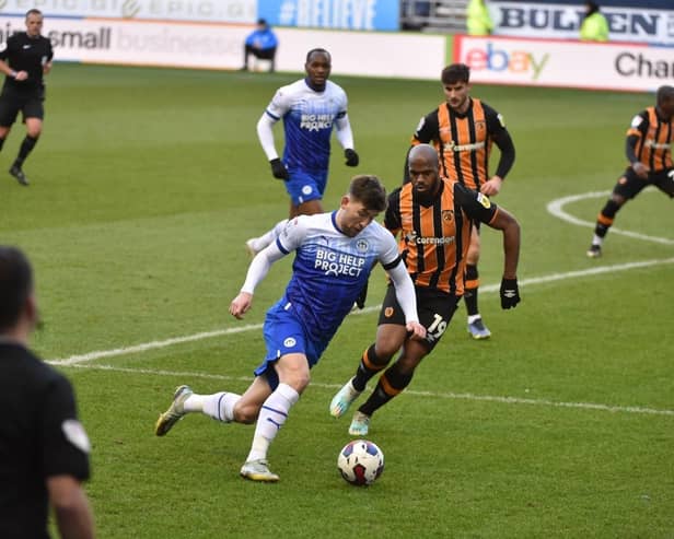 Callum Lang tries to get in behind the Hull defence