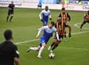 Callum Lang tries to get in behind the Hull defence