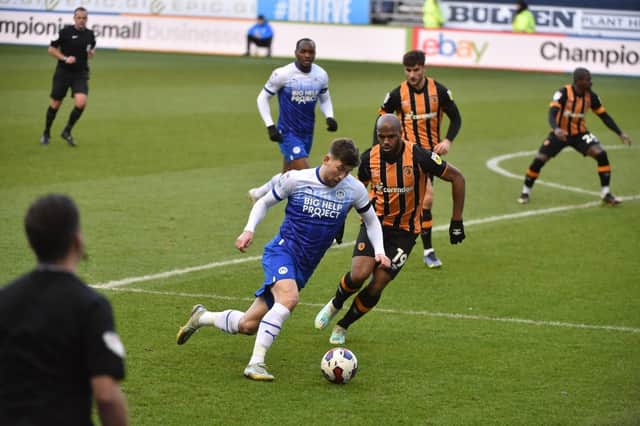 Callum Lang tries to get in behind the Hull defence