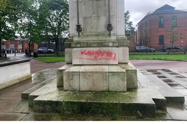 Graffiti spray-painted on Leigh's war memorial
