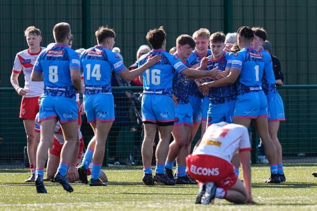Jack Farrimond scored twice as Wigan's academy claimed a 12-10 derby victory over St Helens