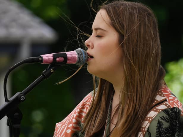 Gracie May performs.