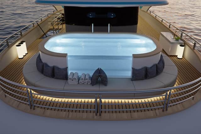 Freedom's pool is lit up for the evening