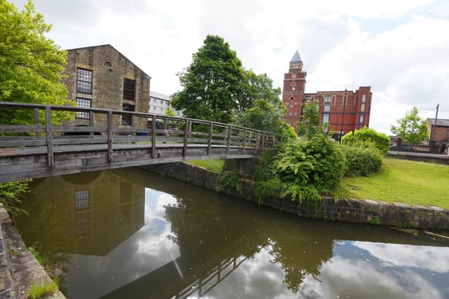 The footbridge over the canal near Wigan Pier buildings, from Wallgate to Pottery Road Wigan - which will be replaced.