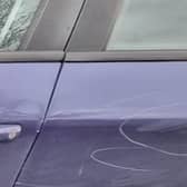 One of the cars believed to have been damaged in the attack