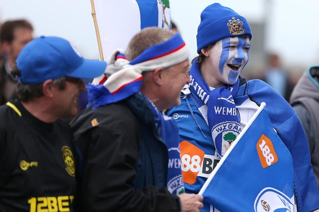 Wigan Athletic fans on Wembley Way outside the stadium.