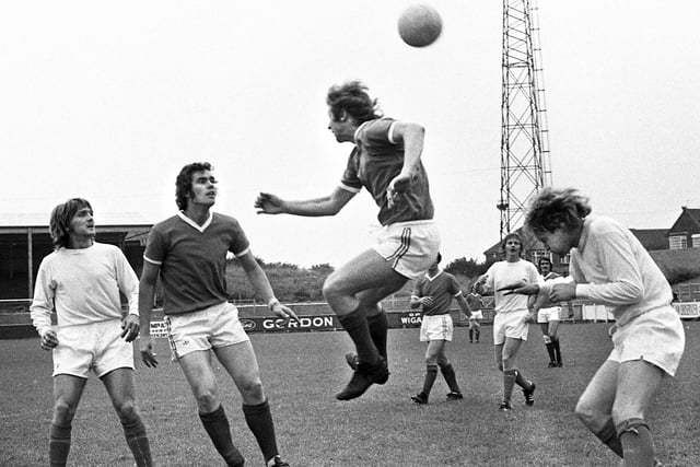 Wigan Athletic forwards Ray Wilkinson and Jimmy Garrett trouble the Gainsborough Trinity defence in a Northern Premier League match at Springfield Park on Saturday 30th of August 1975 which ended in a 0-0 draw.