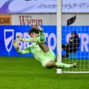 Tom Watson was Latics' hero against Nottingham Forest Under-21s by making three saves out of three in the penalty shoot-out