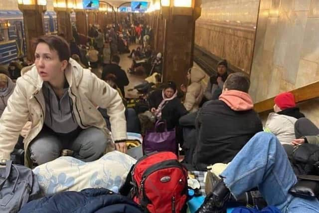 People take shelter in underground stations.