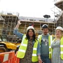 Stacey Astin, left, and Charlotte May from Millennium Care with site manager George Zavelca - celebrate the new building.  Residents, staff and visitors enjoyed a summer party in celebration of the topping out, roof at Langtree Care Home, part of the Millennium Care Group - Standish Care Village, off Chorley Road, Standish.
