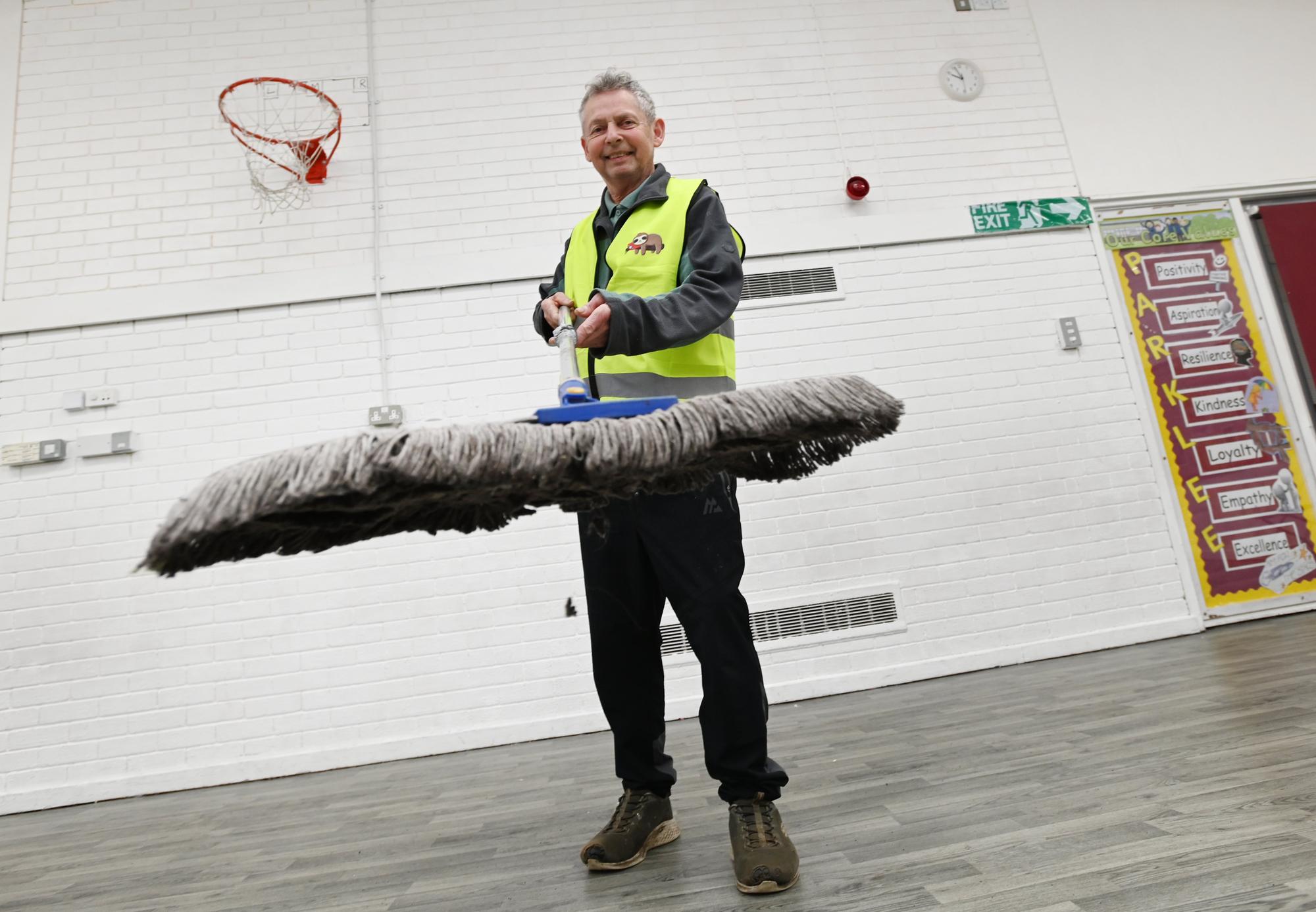 Wigan borough school bids fond farewell to beloved caretaker after 26 ...