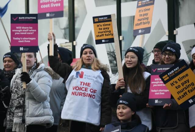 Nurses on the picket line outside Wigan Infirmary last month