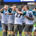 The Latics players celebrate the opening goal of the Kolo Toure era at Millwall last week
