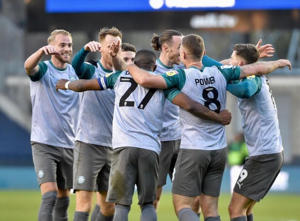 The Latics players celebrate the opening goal of the Kolo Toure era at Millwall last week