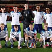 Charlie Hughes (back row, third from left) takes his place alongside fellow Latics Academy graduate Alfie Devie (front row, centre) in England colours (Pic: The FA)