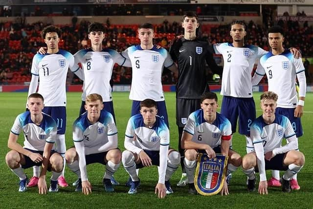 Charlie Hughes (back row, third from left) takes his place alongside fellow Latics Academy graduate Alfie Devie (front row, centre) in England colours (Pic: The FA)