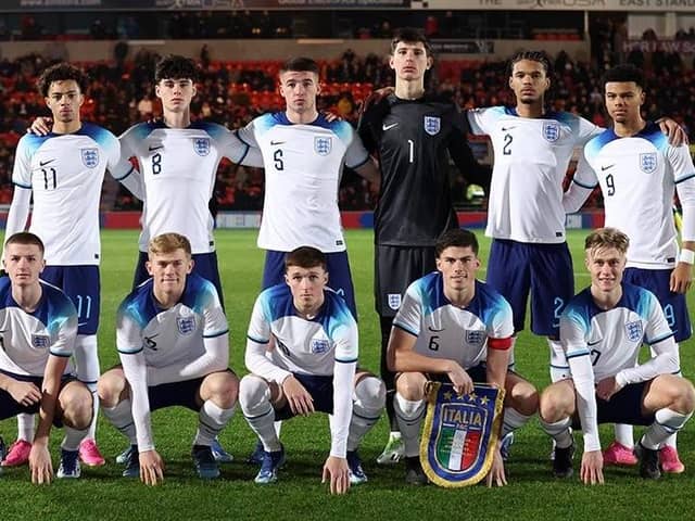 Charlie Hughes (back row, third from left) takes his place alongside fellow Latics Academy graduate Alfie Devie (front row, centre) in England colours (Pic: The FA)