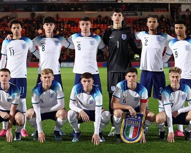 Charlie Hughes (back row, third from left) takes his place alongside fellow Latics Academy graduate Alfie Devie (front row, centre) in England colours (Pic: The FA)