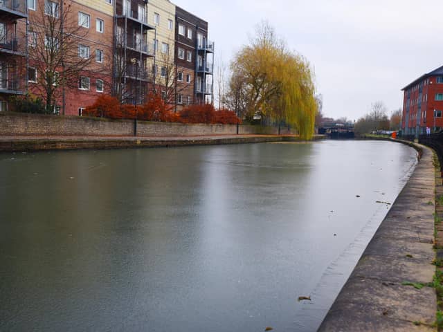Emergency services were called to the Leeds-Liverpool Canal, near Wigan Investment Centre, to rescue a man on Wednesday afternoon