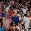 England supporters celebrate after winning the UEFA EURO 2020 semi-final football match between England and Denmark at Wembley Stadium in London on July 7, 2021. (Photo by Paul ELLIS / POOL / AFP) (Photo by PAUL ELLIS/POOL/AFP via Getty Images)