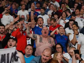 England supporters celebrate after winning the UEFA EURO 2020 semi-final football match between England and Denmark at Wembley Stadium in London on July 7, 2021. (Photo by Paul ELLIS / POOL / AFP) (Photo by PAUL ELLIS/POOL/AFP via Getty Images)