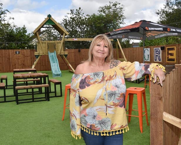 Tina Brown in the garden of The Grey Man, Daisy Hill