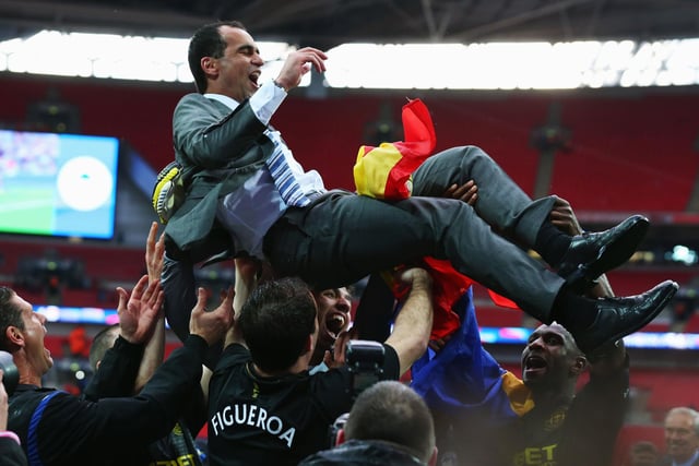 Manager Roberto Martinez of Wigan Athletic celebrates victory with his players after the FA Cup with Budweiser Final between Manchester City and Wigan Athletic at Wembley Stadium on May 11, 2013 in London, England.