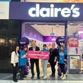 Grand Arcade centre manager Mike Matthews welcomes the team from Claire’s to the centre.