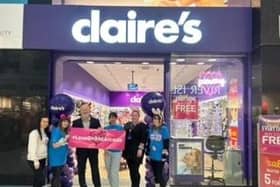 Grand Arcade centre manager Mike Matthews welcomes the team from Claire’s to the centre.