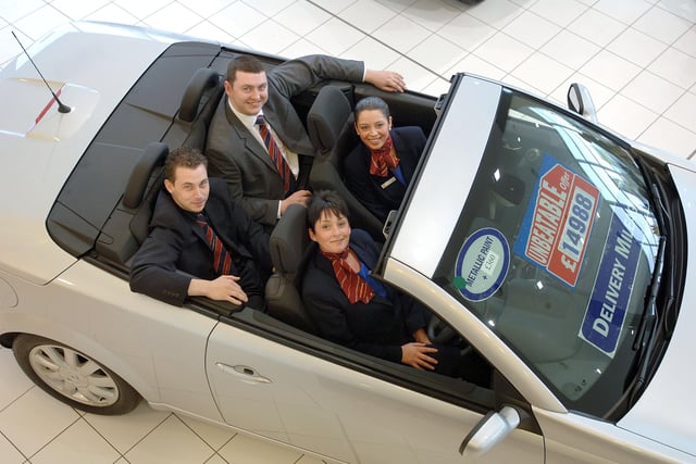 2007 - ARNOLD CLARK RENAULT DEALERSHIP, WIGAN  - Customer care co-ordinator Brenda Seddon, in the driving seat, with receptionist Claire  Farrington and sales executives David Burrell and John Murphy.