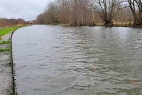 The Leeds and Liverpool Canal close to overflowing near the site