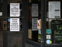 Signs in a coffee shop in Main Street Fort William as people are asked to stop travelling to the Scottish Highlands in a bid to avoid spreading the coronavirus (Photo: Jeff J Mitchell/Getty Images)