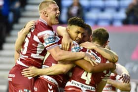 Wigan Warriors returned to winning ways with a victory over Warrington Wolves