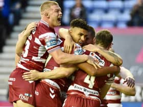 Wigan Warriors returned to winning ways with a victory over Warrington Wolves