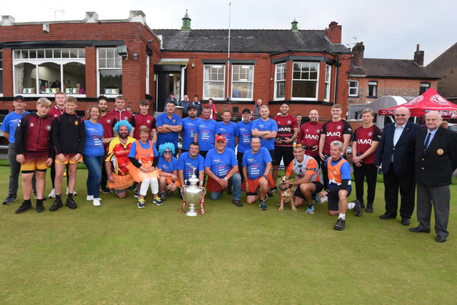 Wigan Warriors players joined youth players and teamed up with senior bowlers at Bellingham Bowling Club, Wigan, part of a Walkathon challenge to visit 14 counties in 14 days, calling in at a crown green bowling club at each to raise funds and awareness of motor neurone disease.