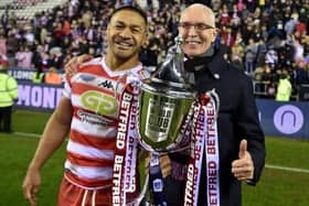 Willie Isa with the World Club Challenge, one of several trophies he has won with Wigan