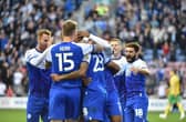 The Latics players celebrate Josh Magennis' goal against West Brom in midweek