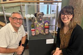 Coun Chris Ready and Eleanor Whitehead, lead officer - museums, with the Hacker T Dog display at the Museum of Wigan Life