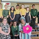 Elizabeth Garner, Bossi Okusanya and Year 2 Students at St Cuthberts Primary School.