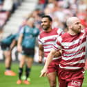 Liam Marshall celebrates his try against Leigh Leopards at the DW Stadium