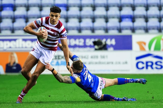 Kai Pearce-Paul escapes a tackle from Leeds’ Liam Sutcliffe.